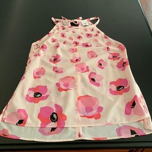 Cabi top, size S, pink with various shades of pink flowers and black center.